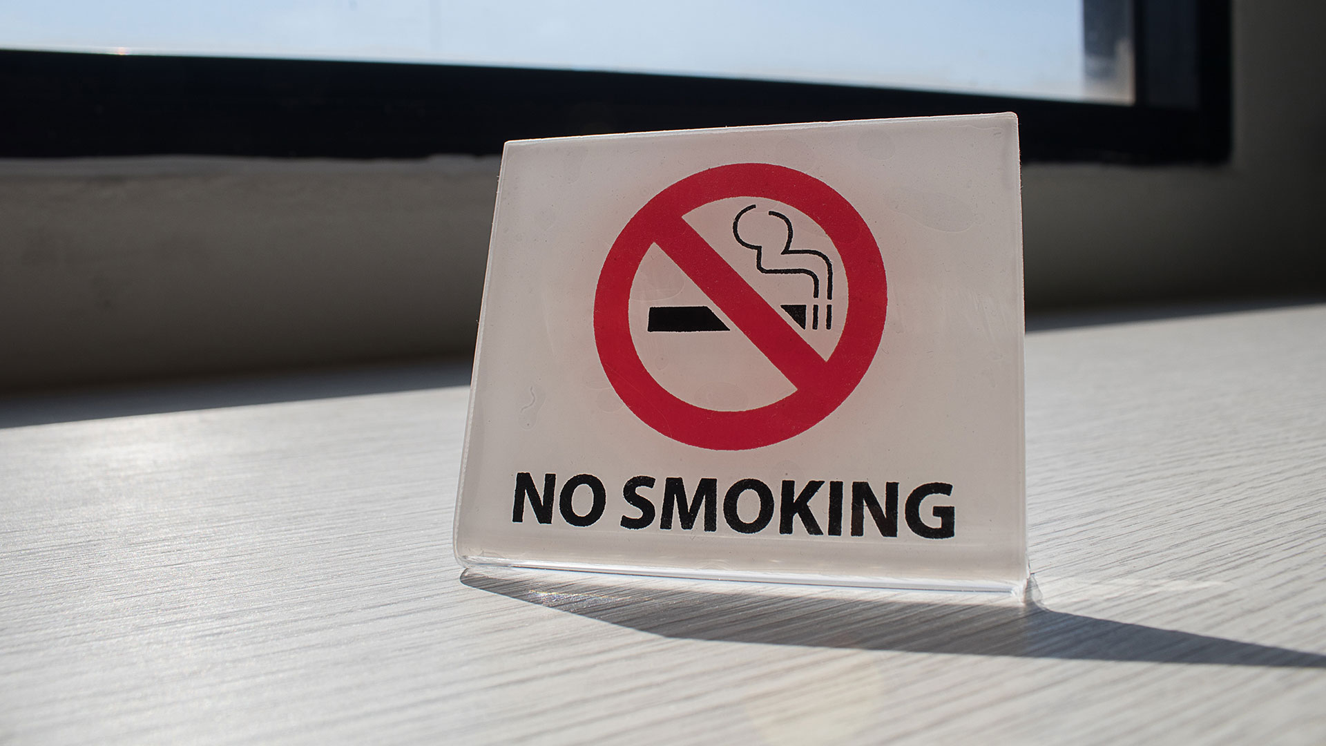 no smoking sign on table top